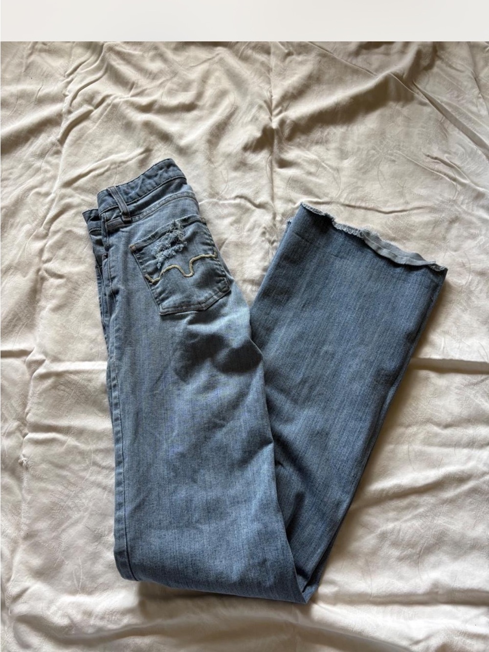 Kimes Ranch Women's Blue Flare Jeans with Raw Edge